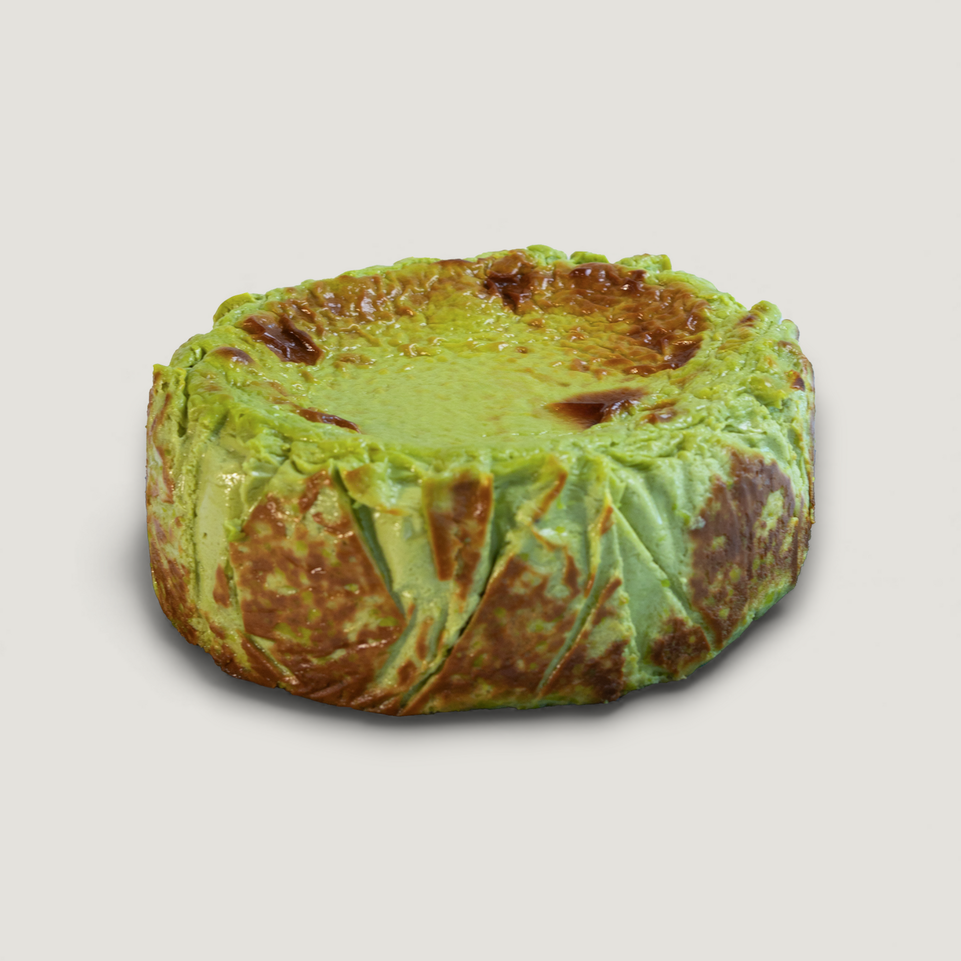 Handmade Matcha Basque cheesecake with caramelized top and creamy center – Bite Cheesecakes San Diego