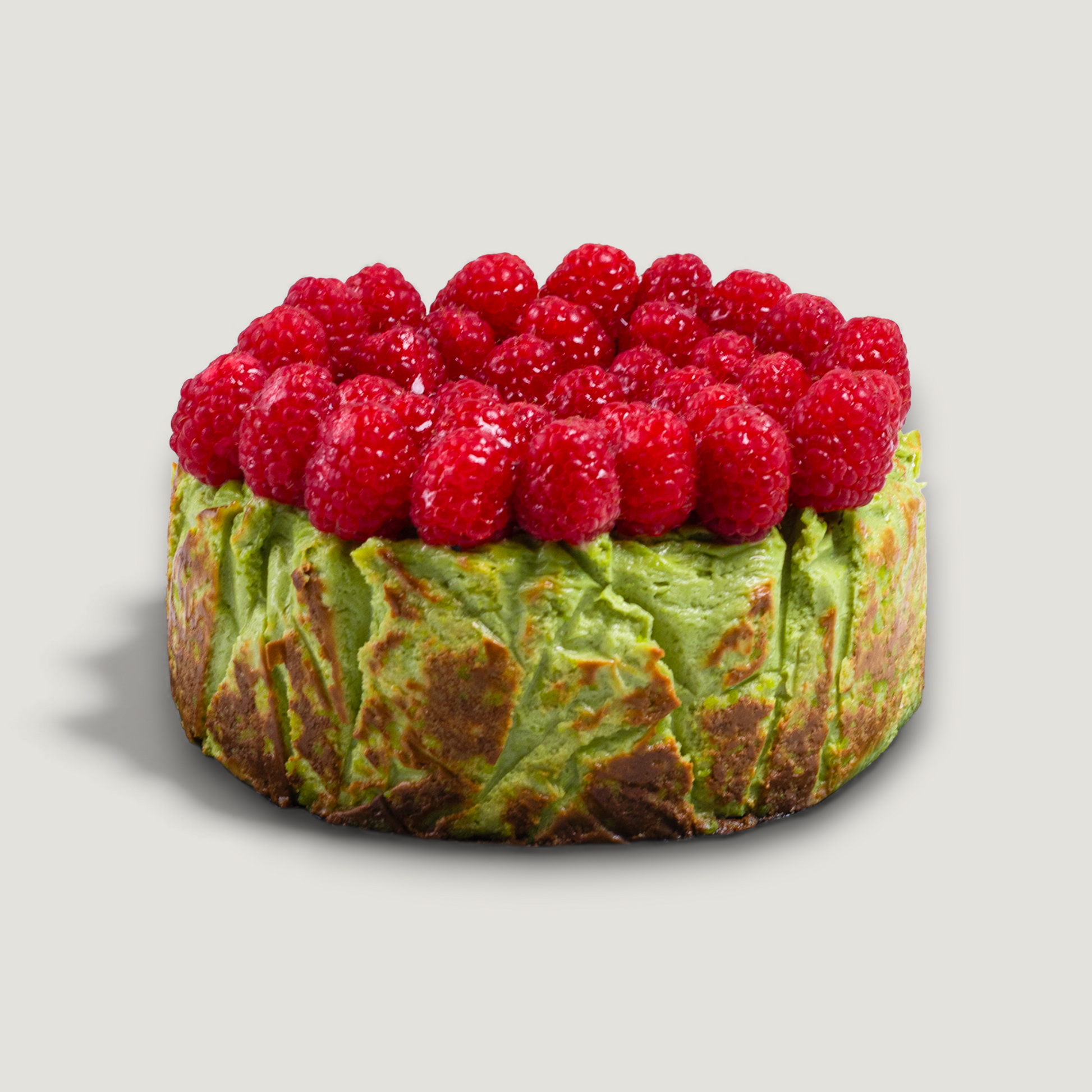 Matcha Basque cheesecake with raspberries and caramelized top – handmade in San Diego
