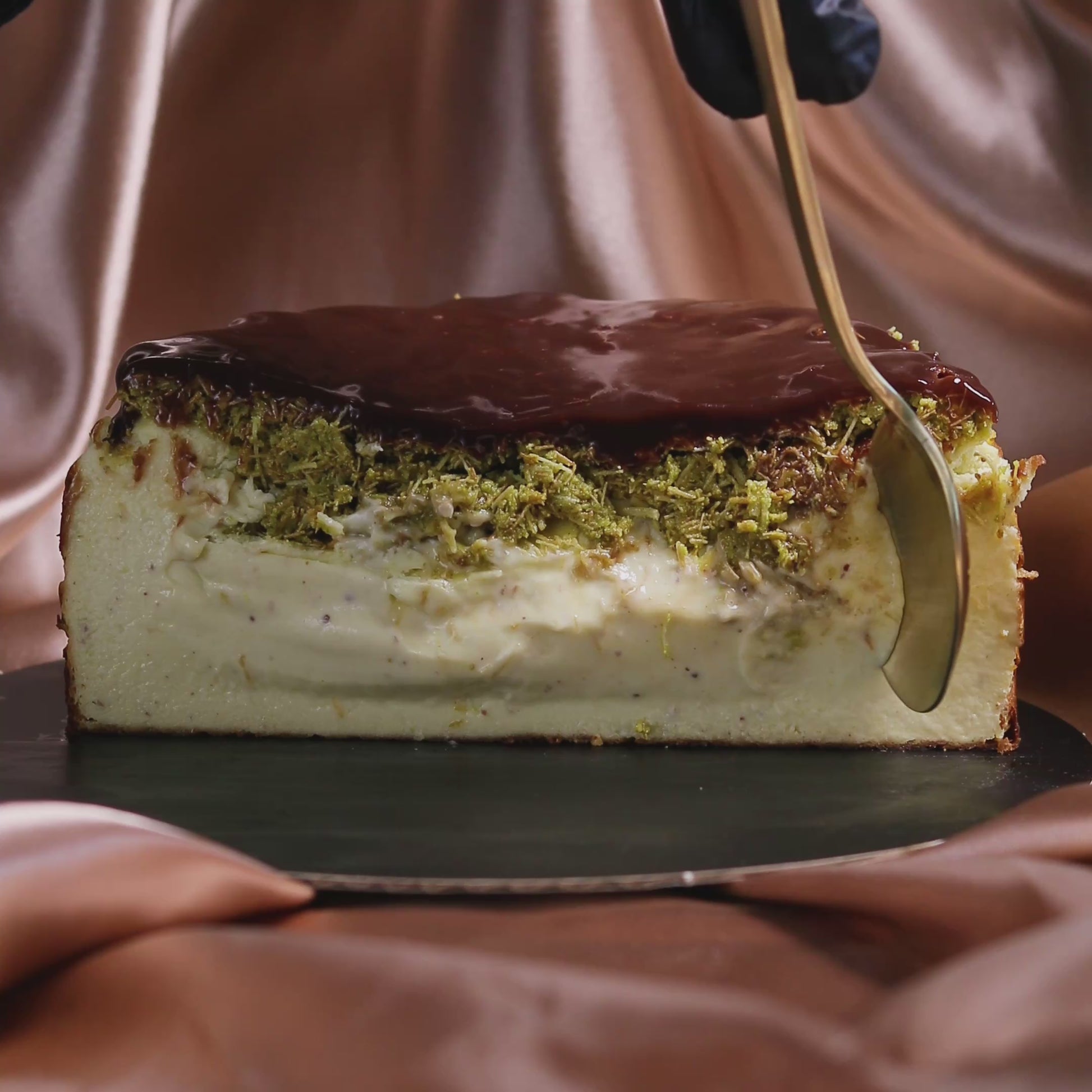 Luxury pistachio chocolate Basque cheesecake with kataifi topping – handmade in San Diego