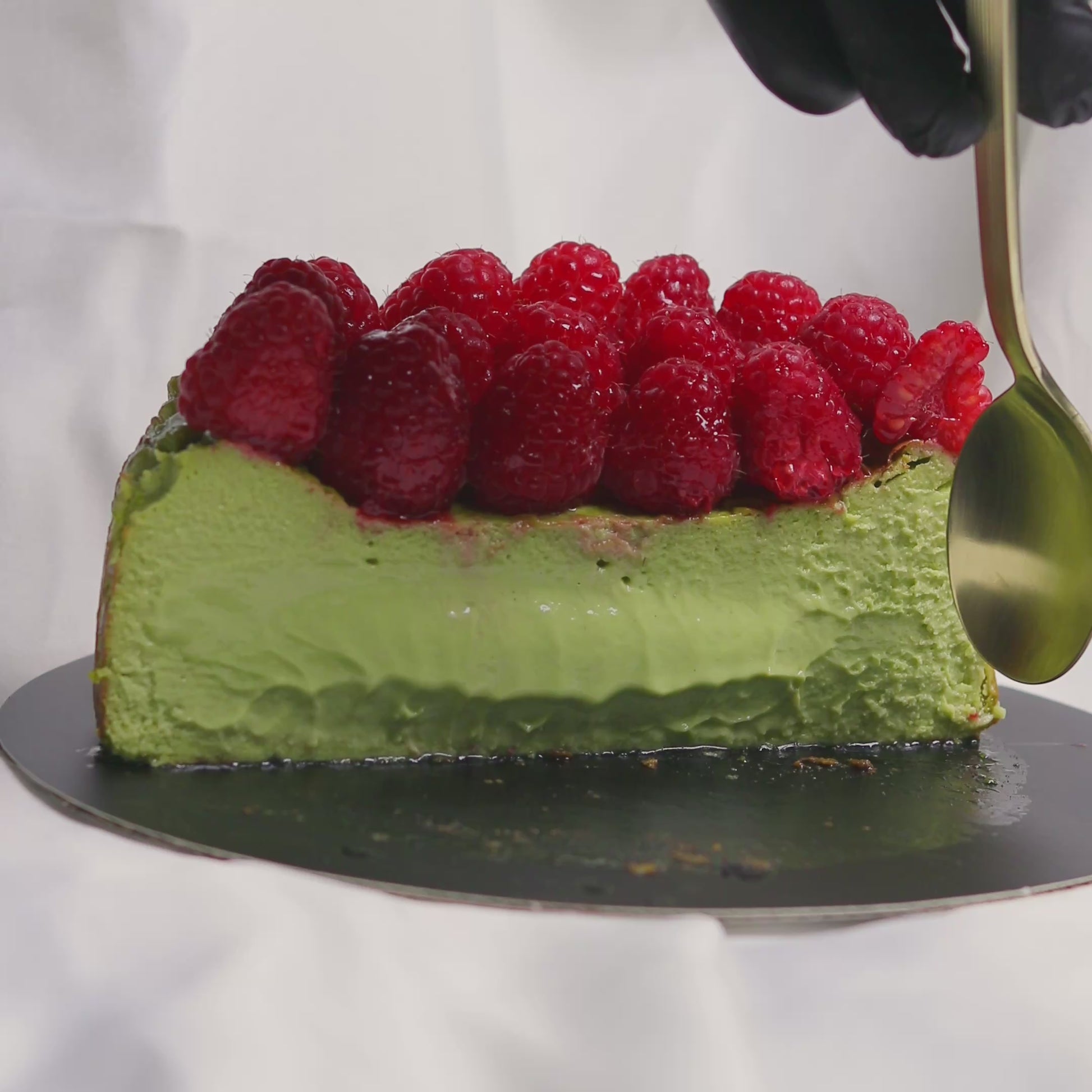 Matcha Basque cheesecake with raspberries and caramelized top – handmade in San Diego